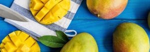 mangoes on blue table